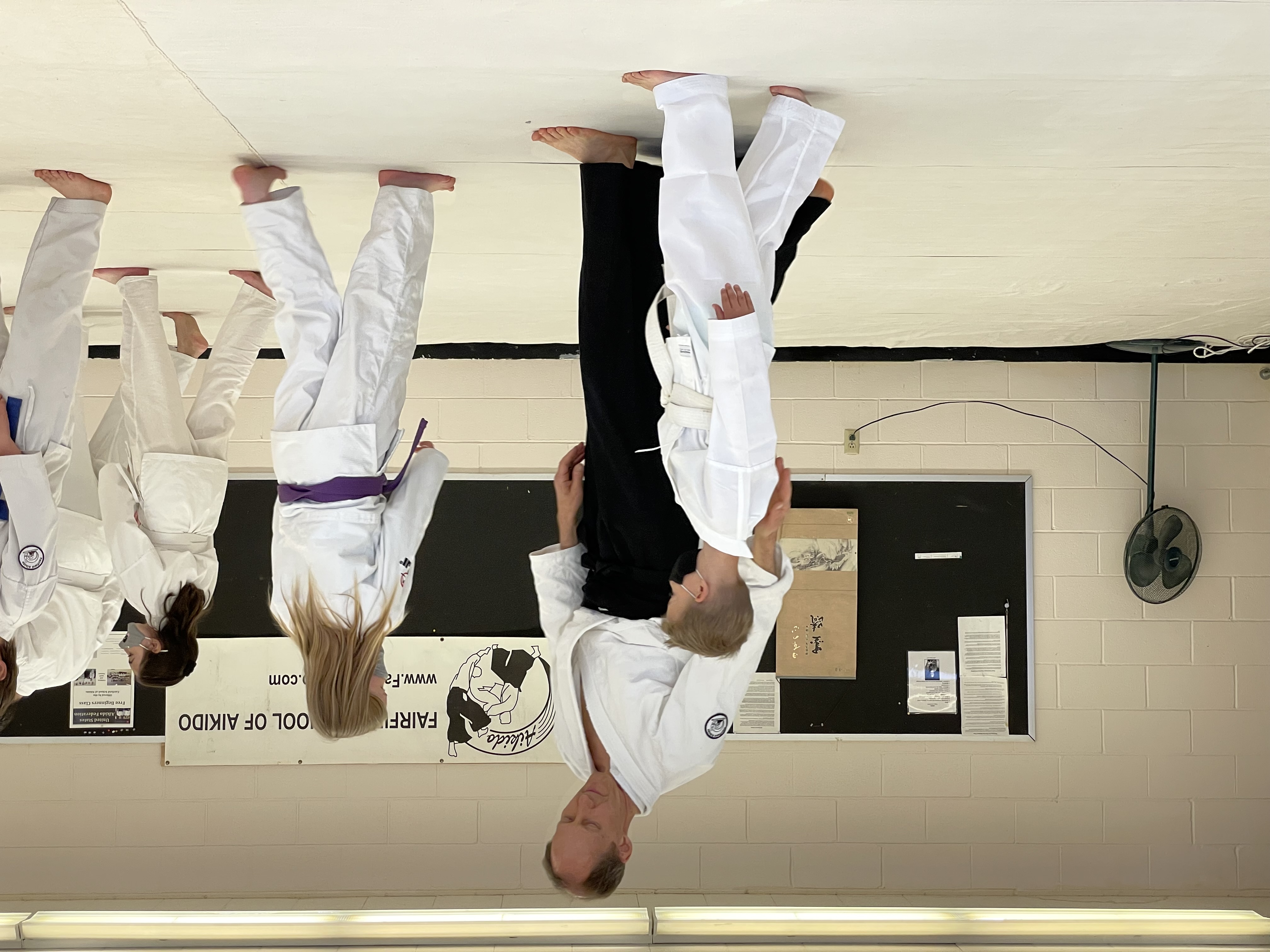Students line up at the front of the dojo